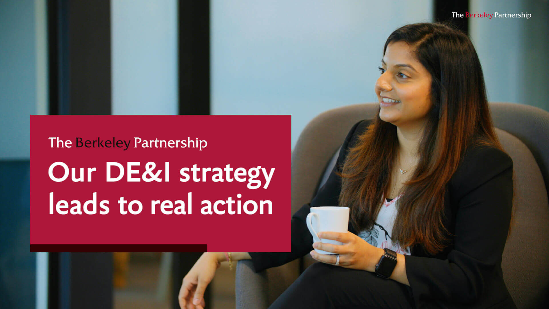 An on-screen banner says 'Our DE&I strategy leads to real action'. In the background, a Berkeley consultant is sitting down, holding a cup of coffee.