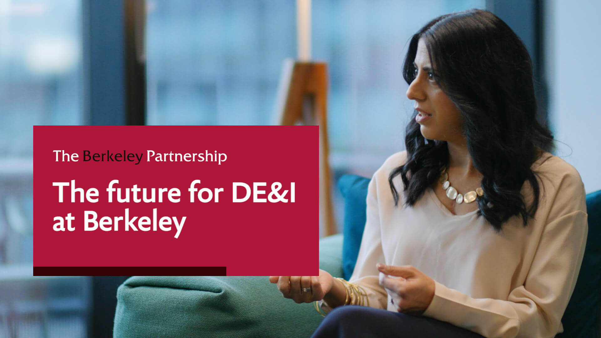 An on-screen banner says 'The future for DE&I at Berkeley'. In the background, a female Berkeley partner is sitting down, speaking to someone off-screen